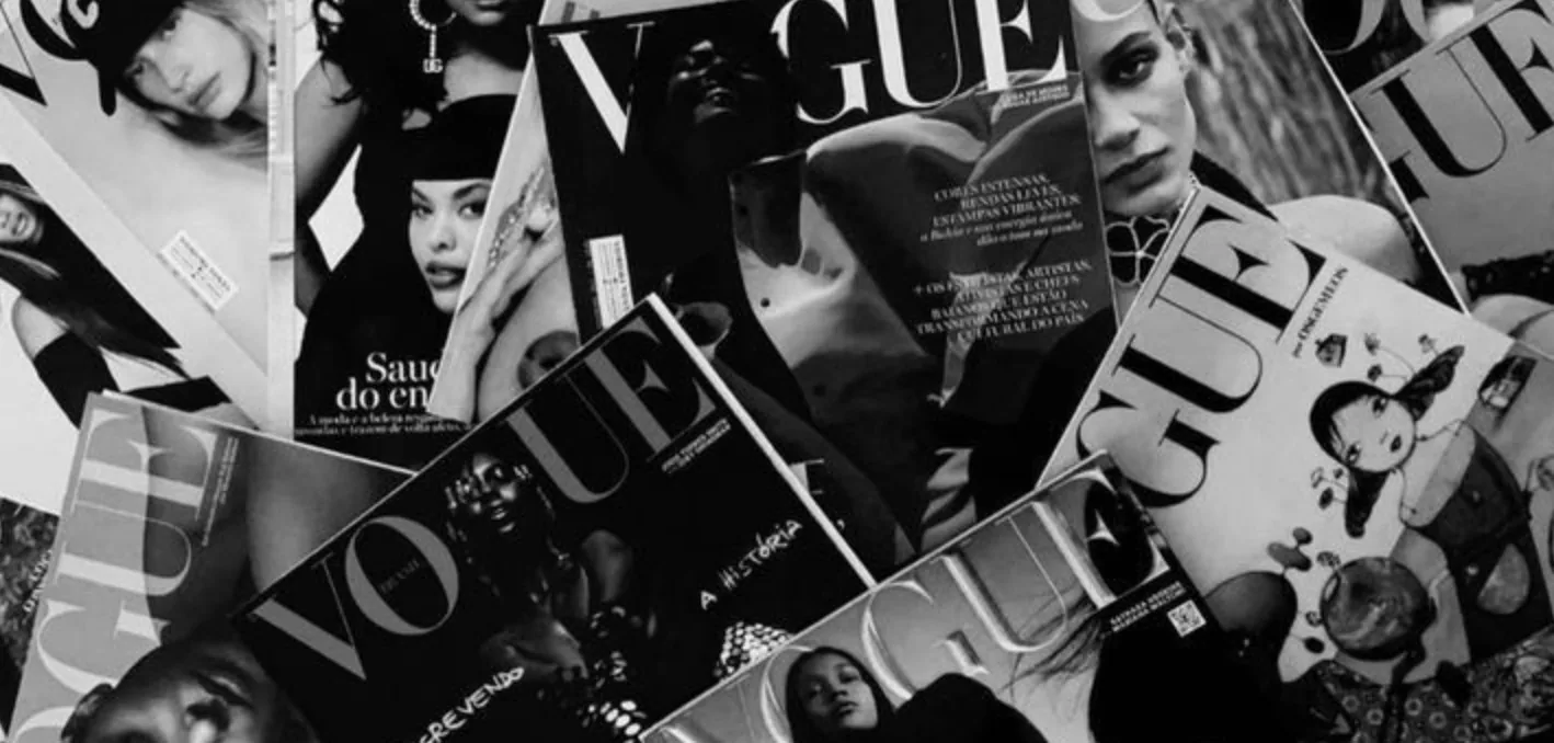 A spread of Vogue covers from several editions, black and white
